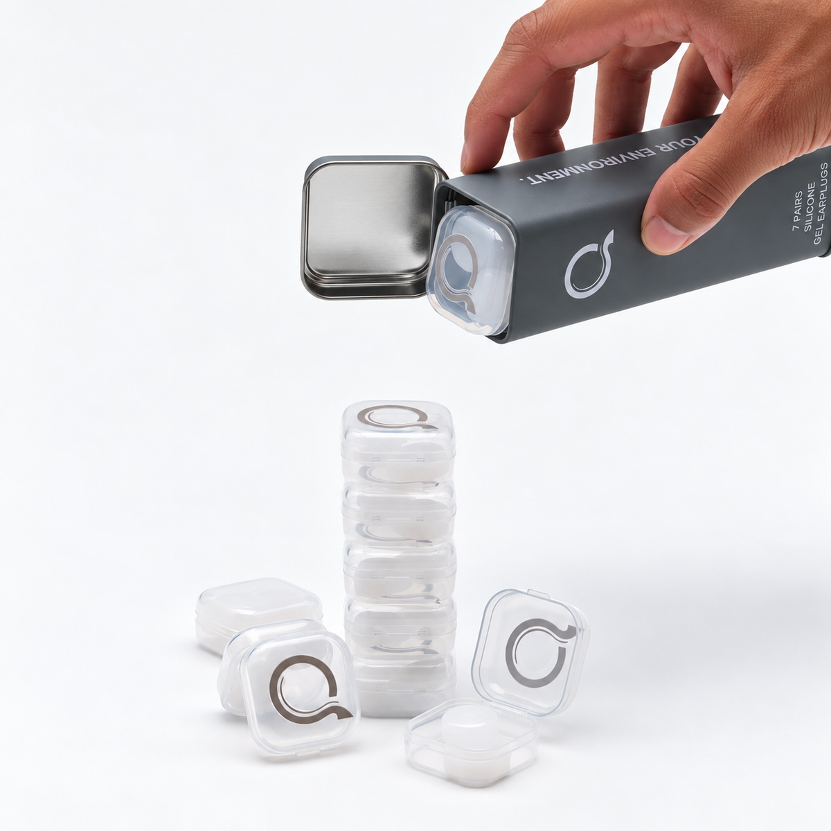 Seven Quintara earplug pods stacked beside the open case
